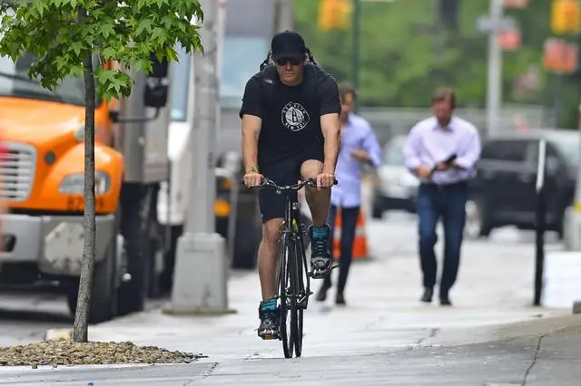 Jake Gyllenhaal can bike on the sidewalk because he's famous. Everyone else must cross their fingers and hope a cop messes up your summons.
